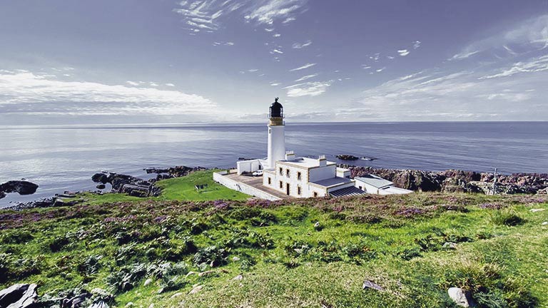 Rua Reidh Lighthouse above the sea near Gairloch in Wester Ross