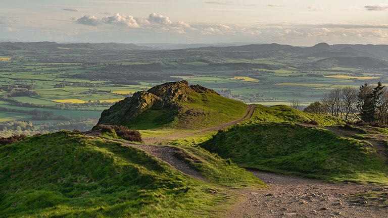 Views from atop the Wrekin hill in Shropshire overlooking rolling countryside beyond