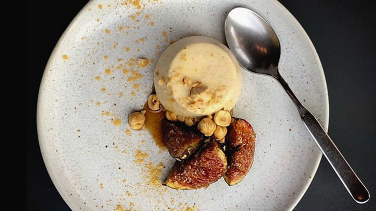 A delicious panna cotta dessert served at Box-E Bristol with honeyed figs