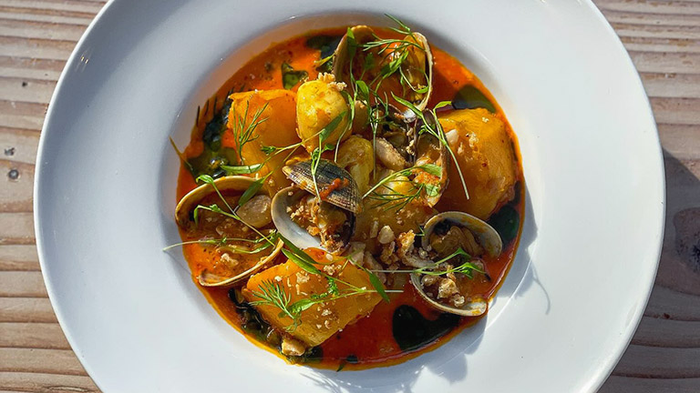 A seafood broth with clams served by Cor restaurant in Bristol
