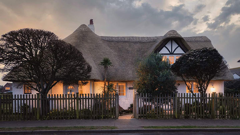 The picturesque thatched exteriors of The Wishing Well in Selsey, Sussex