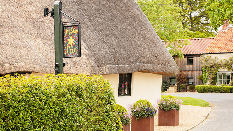 The thatch-topped facade of Star Inn at Harome