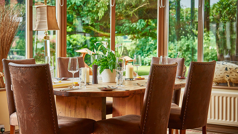 The glass-fronted dining room of The Pipe and Glass, South Dalton