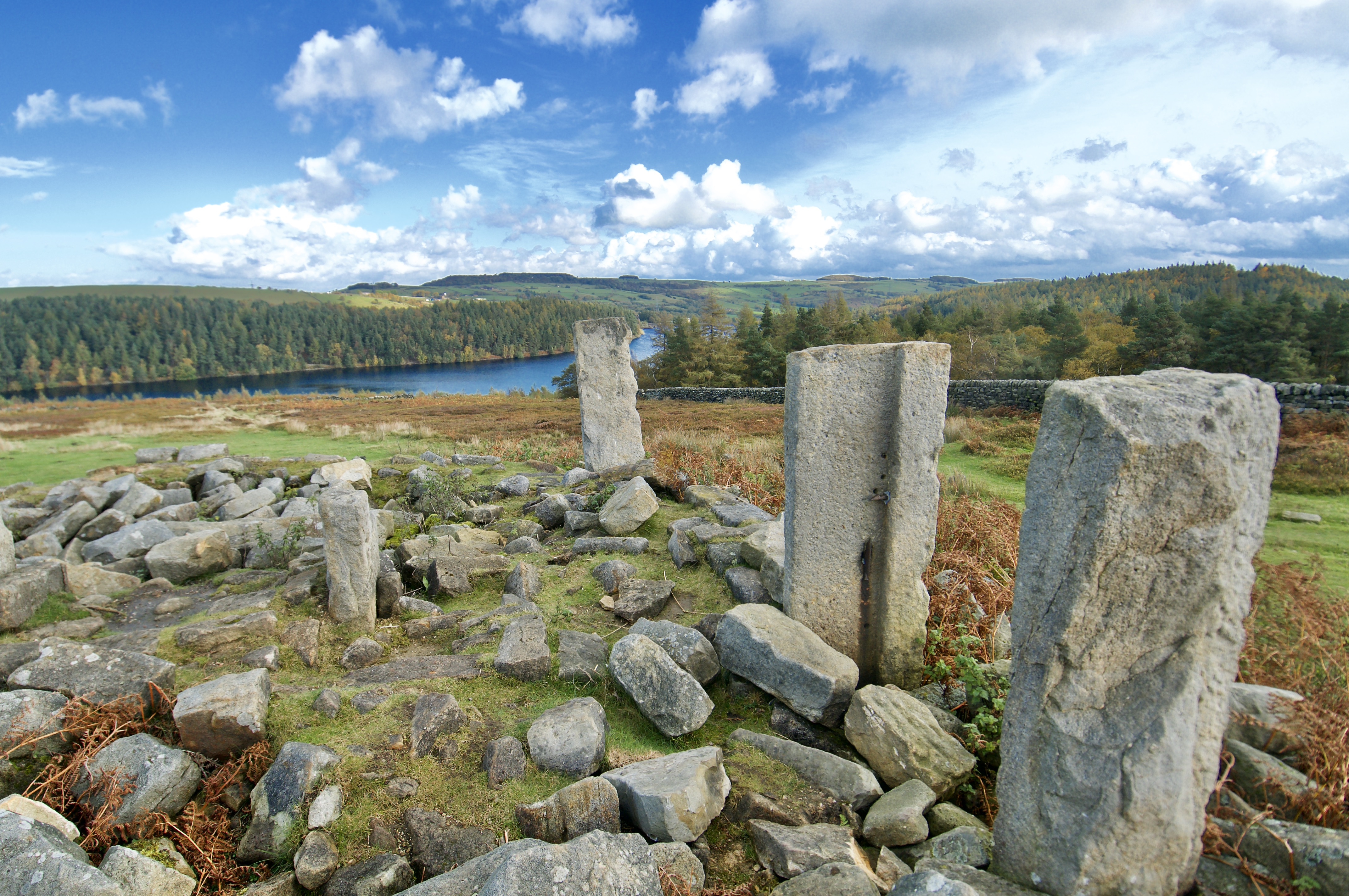 Stones overlooking Langsett Reservoir and surrounding woodland in Yorkshire