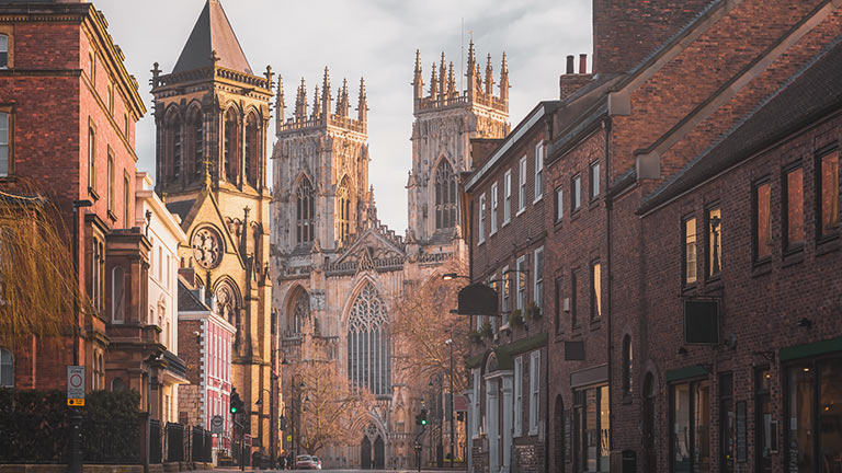 The old streets of York with a view of the world-famous York Minster in Yorkshire